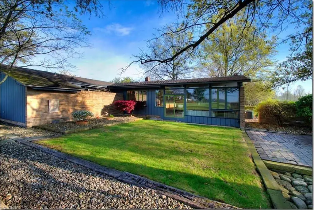 mid century house wooden cabinetry exterior garden 